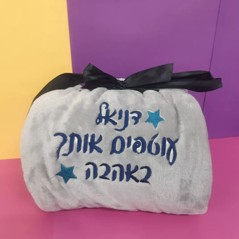 רקמה על שמיכה